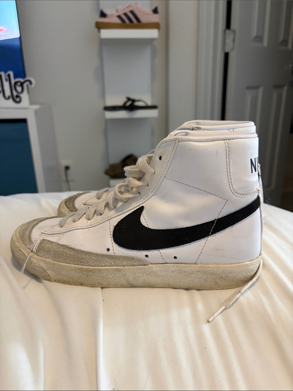 Nike White High-Top Sneakers with Black Swoosh and Cream Suede Trim